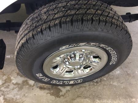 4 NEW TIRES WITH CHROME HUPCAPS.. GREAT VALUE AT $ 9,450